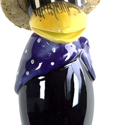 Raven with and straw hat and dark blue scarf with white dots from Goose and Company