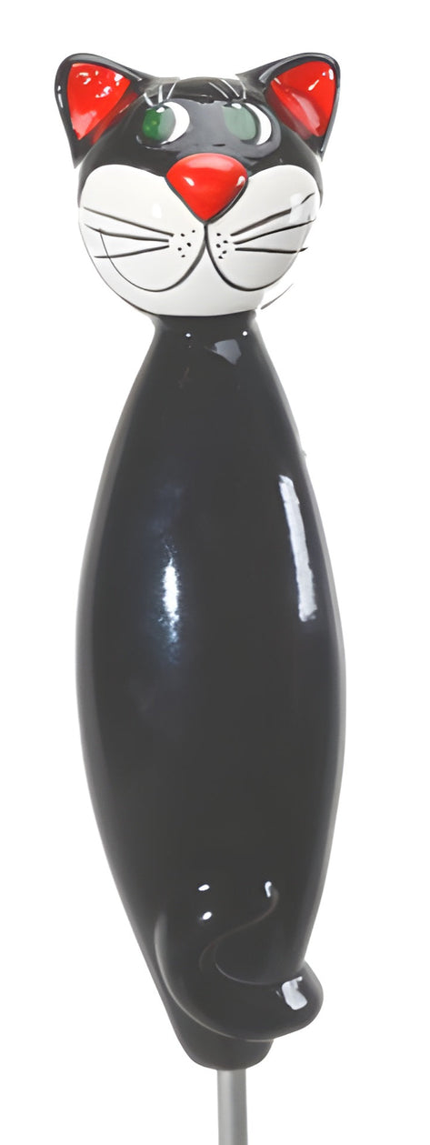 Black cat-shaped object with red eyes and a white face on a white background from Goose and Company. this object is frost resistant