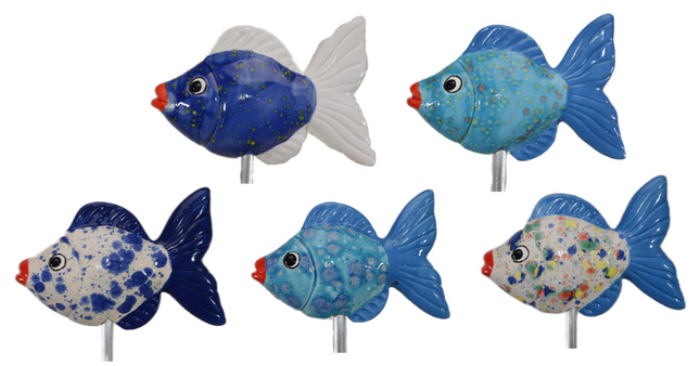 Five decorative fish figures on sticks with blue and white patterns.